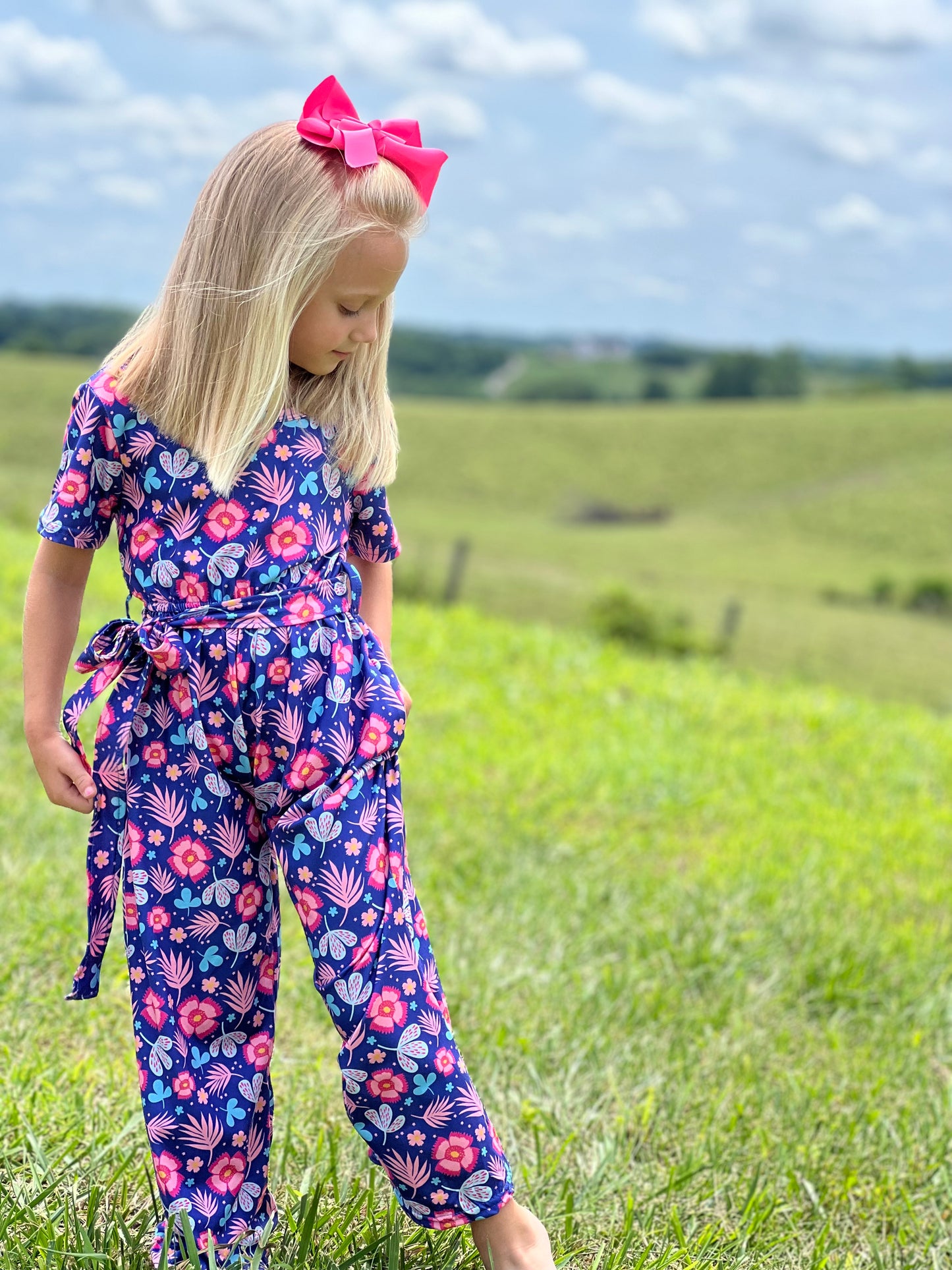 Pink Floral Jumpsuit by Wellie Kate